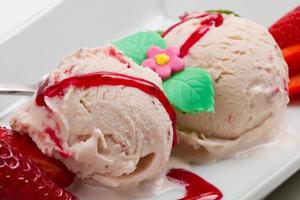 Strawberry ice cream with fruits close up photo