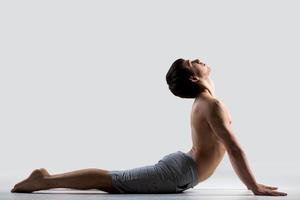 Yoga pose bhudjangasana photo