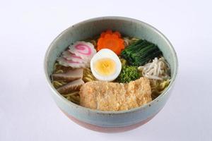 Tonkatsu shoyu ramen isolated on white background, deep fried pork photo