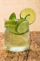 soft drink decorated with lime and mint photo