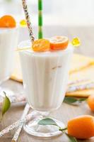 Milkshake with kumquats photo