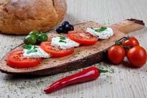 Caprese with olives photo