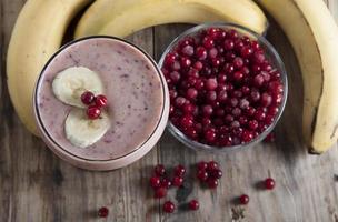 Smoothie of banana and frozen cranberries  . photo