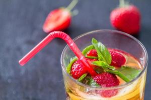 Strawberry lemonade and ingredients - strawberry, lemon, sugar, mint