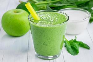 Healthy smoothie with green apple, spinach, lime and coconut milk