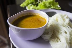 rice vermicelli eaten with minced fish soup photo