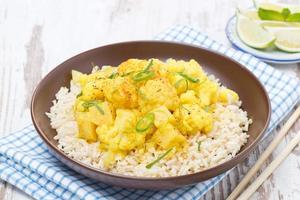 Thai food - vegetable curry with cauliflower and rice photo