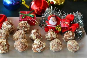 Homemade chocolate truffles with nuts Christmas dessert photo