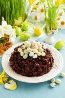 Traditional Easter cake of chocolate with chocolate eggs. photo
