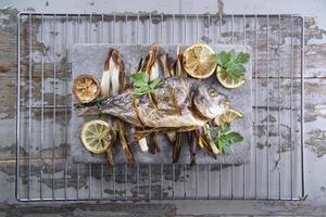 Sea bream baked in the oven photo