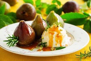 Baked figs with caramel and ice cream. photo