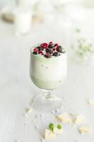 berry fruit and pistache avocado natural ingredient milkshake photo