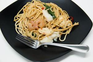 Italian recipe: spaghetti and seafood photo