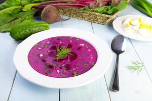Soup with fresh beets served cold and cream photo