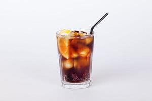 cola cocktail with lemon and ice photo