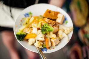 Thai fried tofu with vegetables photo