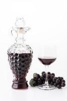 Red wine and grapes
