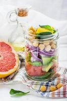 Delicious salad put into a jar for easy transport photo