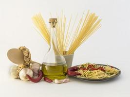Plate of spaghetti with garlic, oil and chilli photo
