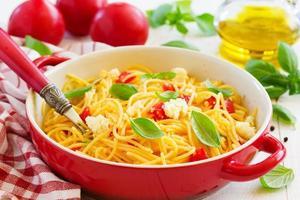 Gluten-free pasta with tomato sauce and cheese.