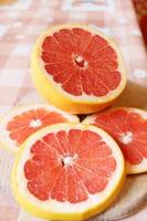 fresh sliced grapefruit on the table