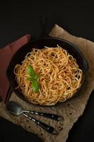 Linguine with Basil and Red Sauce in Cast Iron Pan