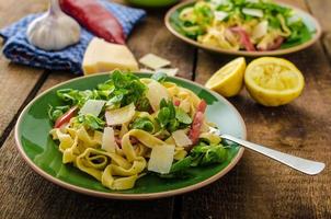 Tagliatelle with bacon, garlic and salad