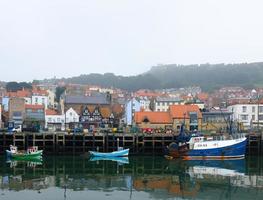 Three fishing boats in Scarborough harbour photo