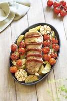 Baked fillet mignon with chorizo and vegetables photo