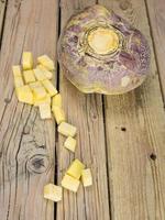 whole and diced swede root vegatable photo