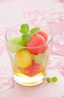 The dessert salad of watermelon and cantaloupe with honey.