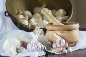 Garlic for cooking on the table of the kitchen photo
