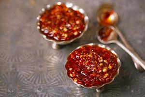Extreme hot asian chillies garlic sauce photo
