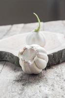 garlic on wooden background photo