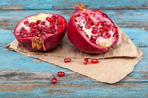 Fresh pomegranate on wooden boards. photo