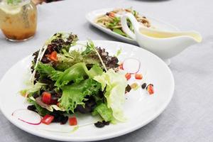 Vegetable and salad dressing photo