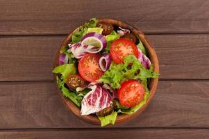 Fresh vegetable salad in a bowl photo