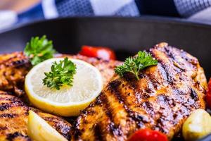 Grilled chicken breast in different variations photo