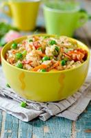 Pilaf with chicken and vegetables photo
