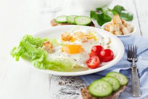 Breakfast with fried egg photo