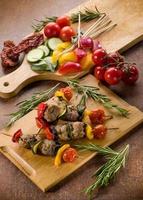 skewer with meat balls and vegetables photo