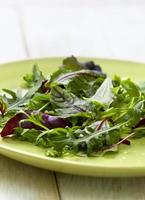 mixture of salad on a wooden background