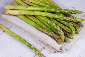 Asparagus on wooden background