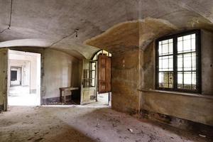 Old abandoned frescoed room photo