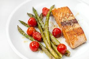 Salmon fillet with asparagus and cherry tomatoes