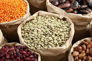 green lentils and dried beans in paper bag