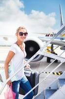 Female passenger boarding an aircraft