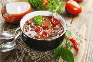 Chili soup with red beans and greens photo