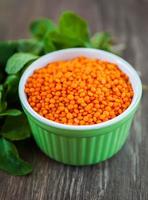 red lentils in a green bowl photo