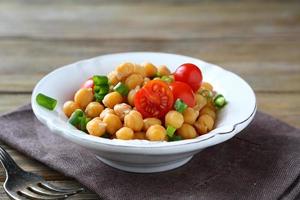 Chickpeas with vegetables in a bowl photo